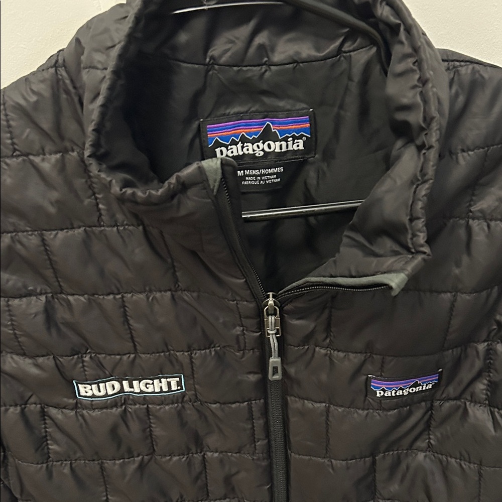 Patagonia Black Quilted puffer vest with Bud Light Patch